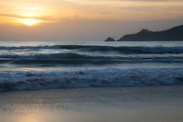 Sunset on the beach .