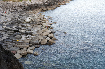 People fishing on the offshore barrier