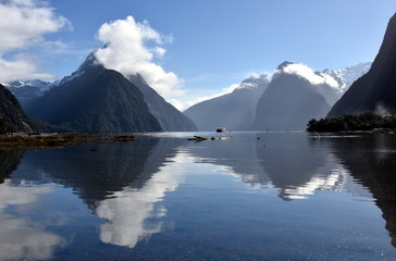 Milford Sound and Mitre Peak in Fiordland New Zealand, water reflection. 8th wonder of the world.