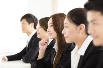 Group of business people having meeting in office