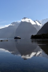 Milford Sound and Mitre Peak in Fiordland New Zealand, water reflection. 8th wonder of the world.