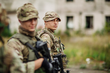 Fototapeta premium Army soldier during the military operation in the city. war, arm