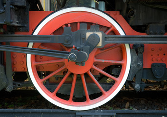 Fototapeta na wymiar Red wheel of old steam train