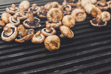 Mushroom barbecue roasted on metal grill