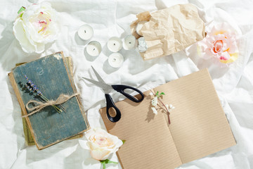  flowers with empty vintage notebook for your design