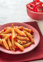 Penne with tomato sauce and fresh red pepper