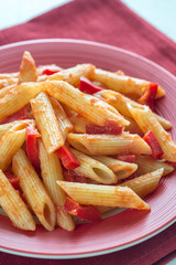 Penne with tomato sauce and fresh red pepper