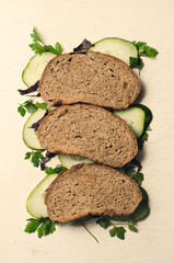 Bakery product. Delicious rye bread and vegetables. Food concept