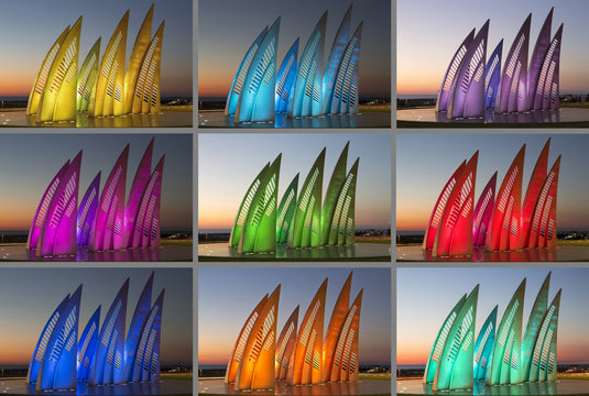 Sculptural group sail with changing colors at sunset in Ashdod, Israel. Collage