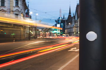 Naklejka premium Bluetooth Low Energy Beacon – location intelligence sensor in smart cities / A Bluetooth Beacon device installed on a bus stop, to digitally guide passengers.