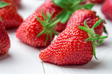 Fresh strawberry background. Ripe  in close-up.