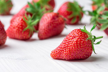 Fresh strawberry background. Ripe  in close-up.