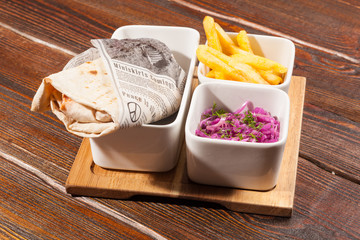 shawarma with salad and French fries