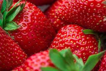 Fresh strawberry background. Ripe  in close-up.