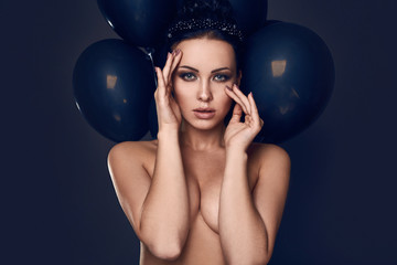 Beautiful fashion naked model girl with black balloons
