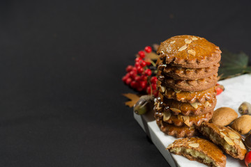Typical Dutch filled spicy coffee cookies with almonds copy space