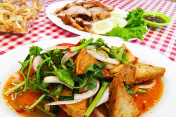 Thai pork sausage salad, Thai cuisine spicy pork salad.