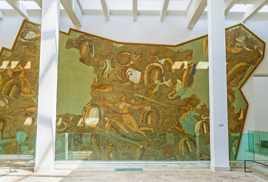 The mosaic panel on the wall