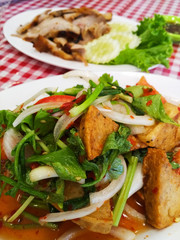 Thai pork sausage salad, Thai cuisine spicy pork salad.