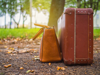 Vintage luggage against a bright 