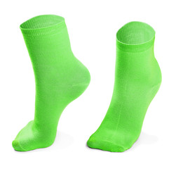 green pair of socks isolated on white background 