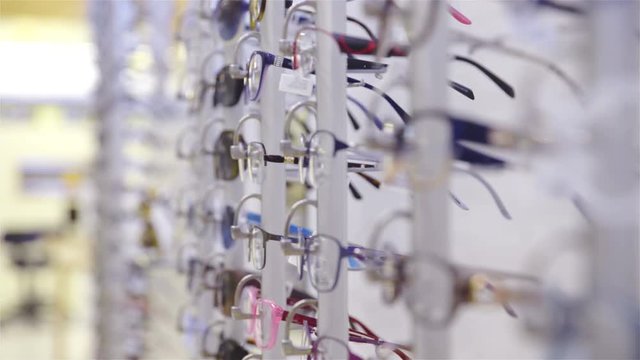 Exhibition of eyeglasses store close up 4K