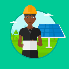Female worker of solar power plant.