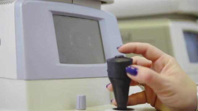 Operating joystick while device scanning person eyeball 4K