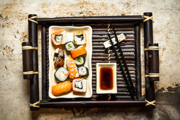 The rolls and sushi plate with soy sauce