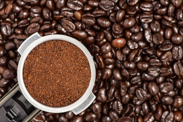 Filter holder for espresso coffee machineon coffee beans backgro