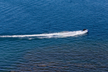 jet ski on the surface of the water at a speed of