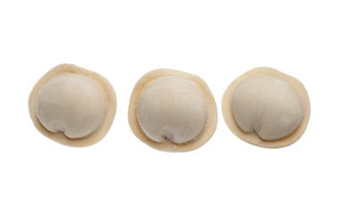 Raw frozen dumplings - pelmeni, isolated on white background