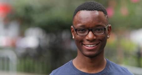 Young black man in city face portrait