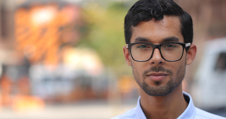 Obraz premium Young man in city face portrait