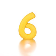 number six 6 made from plasticine isolated yellow