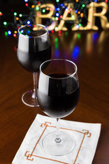 Glasses of red wine.