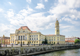 Fototapeta na wymiar 10 September 2016 - Oradea, Romania: City town hall Palace built in eclectic architectural style on the side of the Crișul Repede river