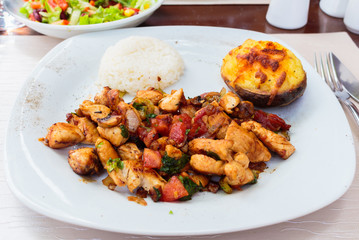 Plates, dishes ready to serve. Meat and chicken.