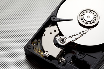 Open hdd drive on metal background