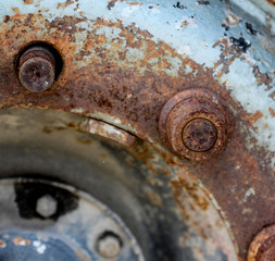 details close upof and old rusty truck wheel
