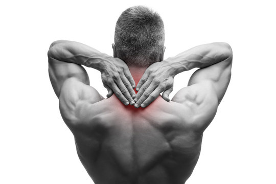 Middle aged man with pain in neck, muscular male body, studio isolated shot on white background with red dot