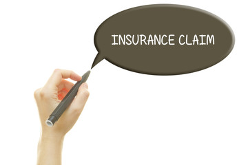 Woman hand writing INSURANCE CLAIM on a transparent wipe board.