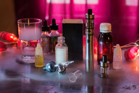 Refill vaporizer with E-juice or e-liquid for smoking safely.