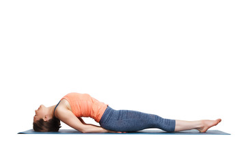 Beautiful sporty fit yogi girl practices yoga asana Matsyasana