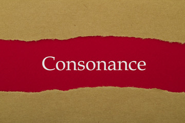 Consonance word written under torn paper.