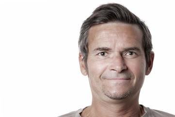 Smiling adult man on white background