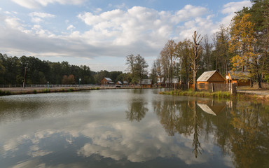 Golden autumn in Central Russia. September evening in tourist camp.