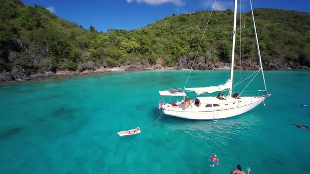 aerial video of group of people relaxing and snorkeling in St John, United States Virgin Islands