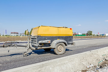 Movable compressor for handheld jackhammer