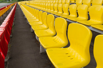 Obraz premium yellow-red grandstand at the stadium